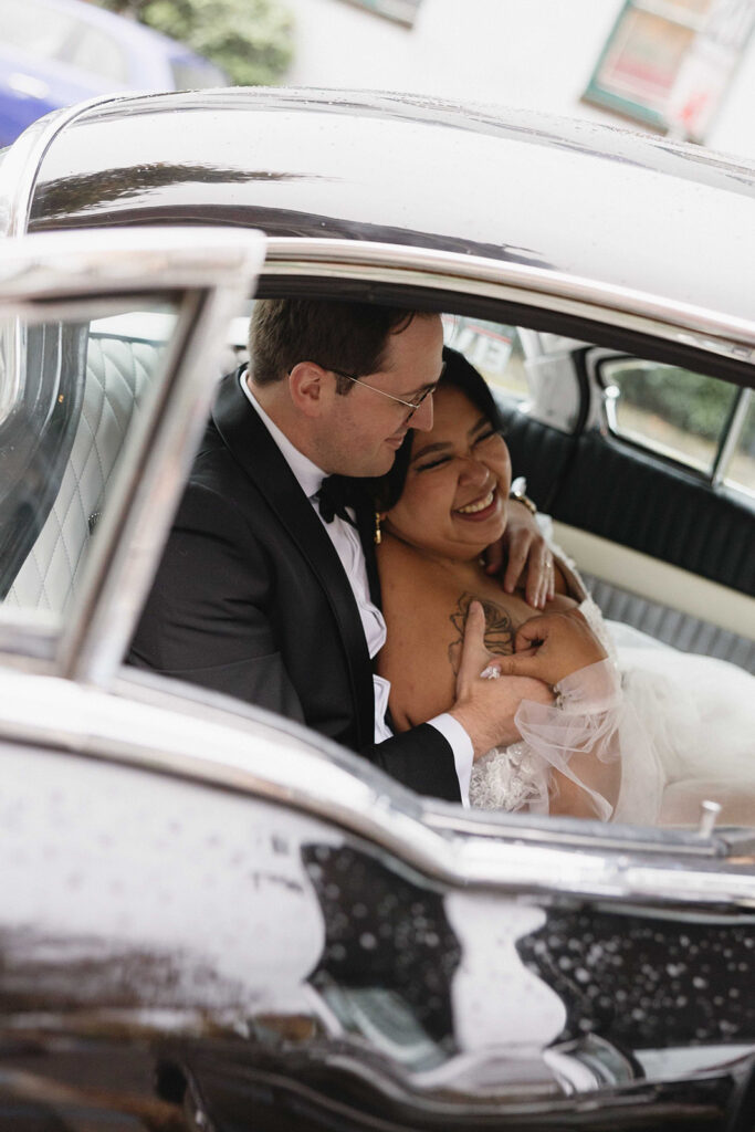 A Moody + Romantic Portland Oregon Wedding In Fall | bride and groom in a vintage car