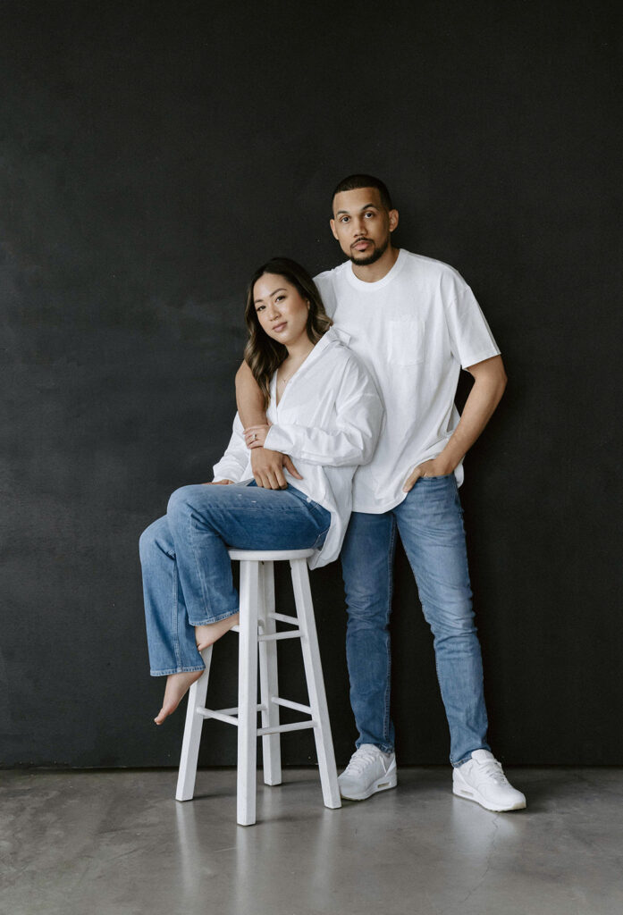 couple posing in downtown portland in a studio for their engagement photos