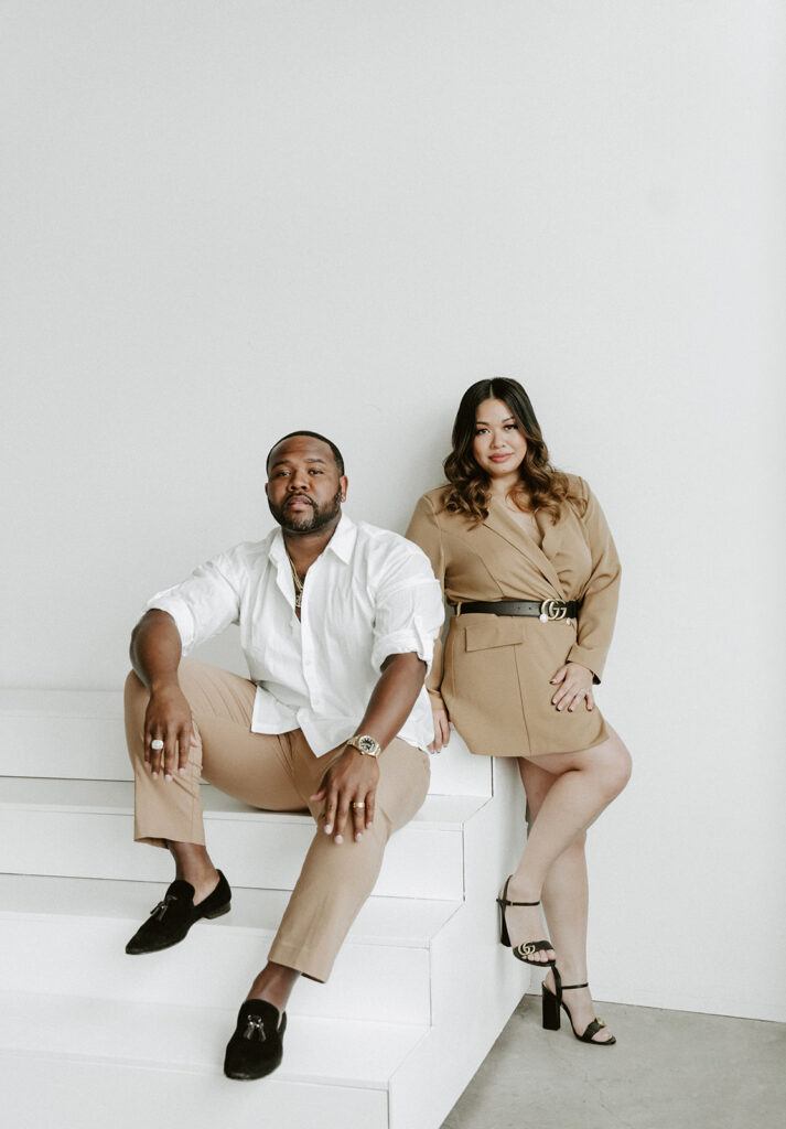 couple posing in downtown portland in a studio for their engagement photos