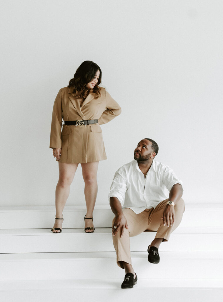couple posing in downtown portland in a studio for their engagement photos