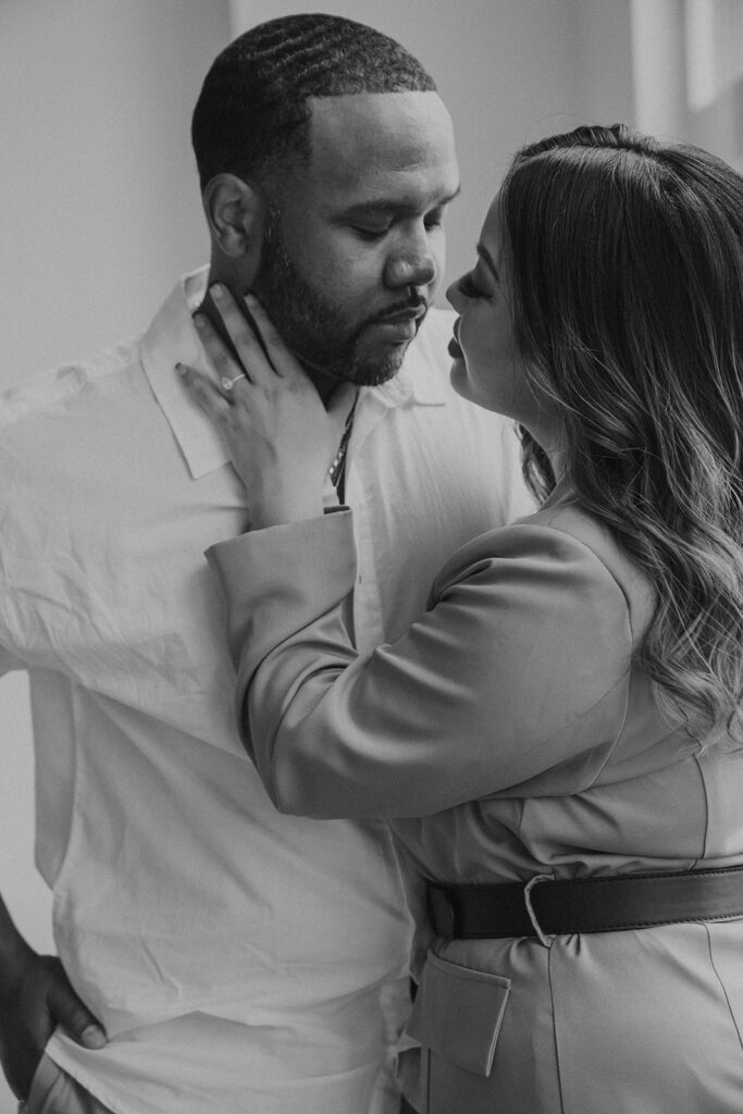 couple posing in downtown portland in a studio for their engagement photos