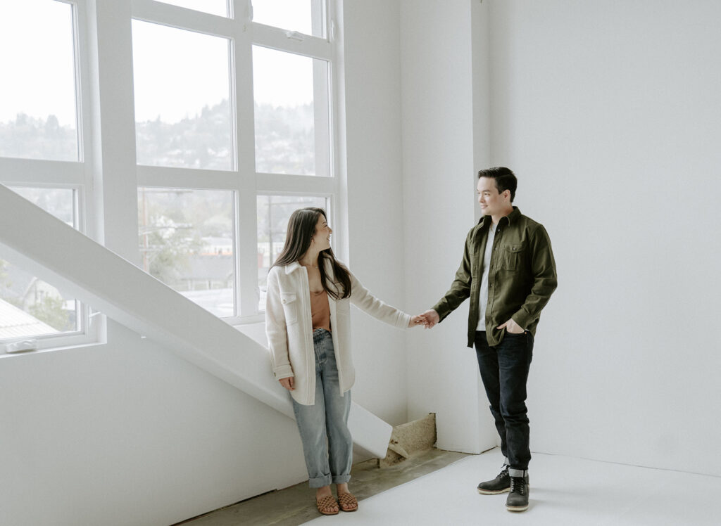 an intimate engagement photoshoot in a studio in portland oregon
