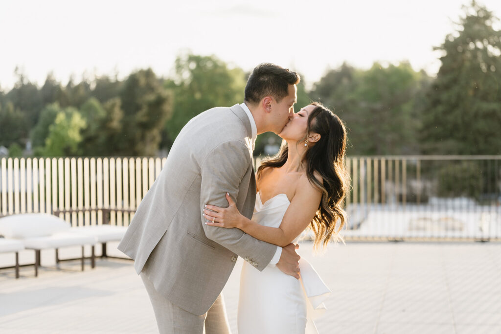 bride and groom posing