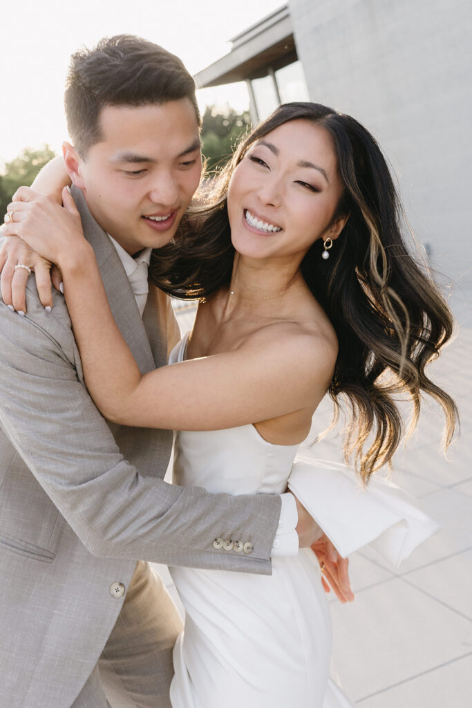 bride and groom posing