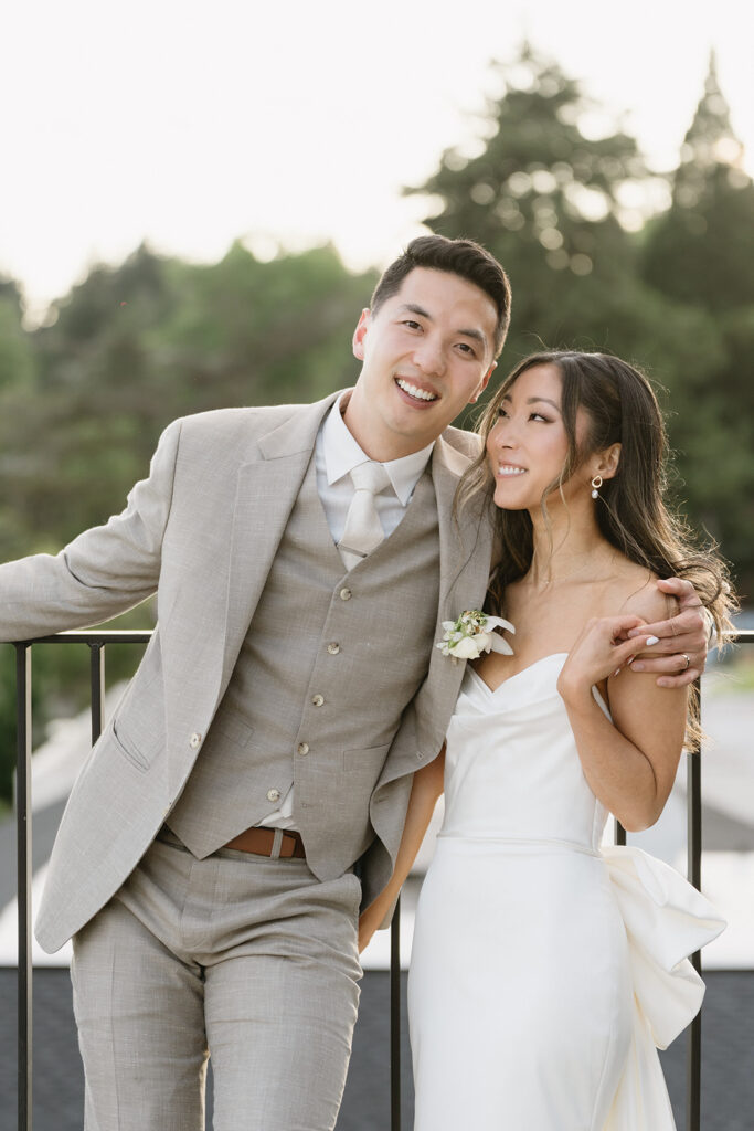 bride and groom posing