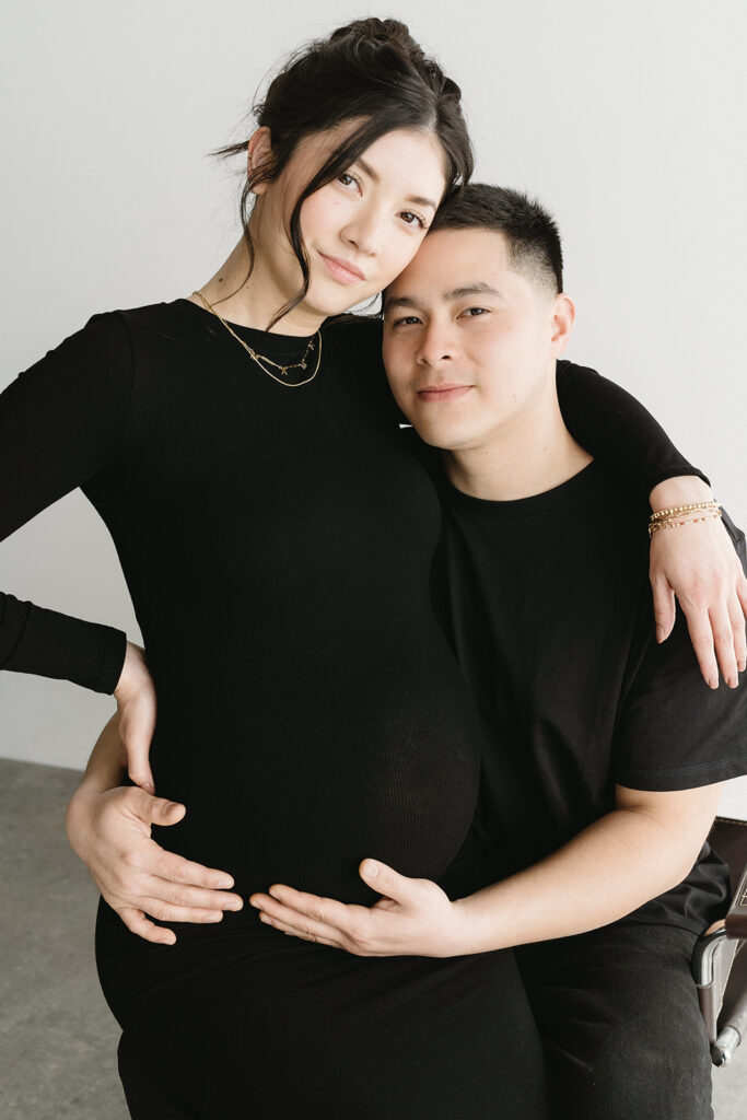 couple taking maternity photos in portland
