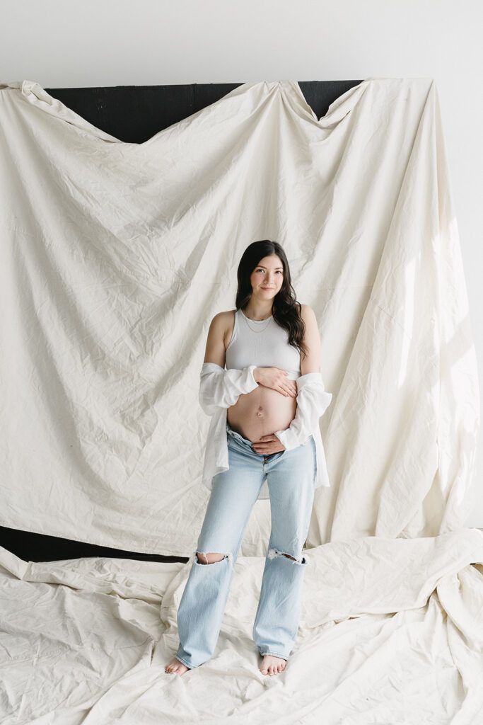 couple taking maternity photos in portland
