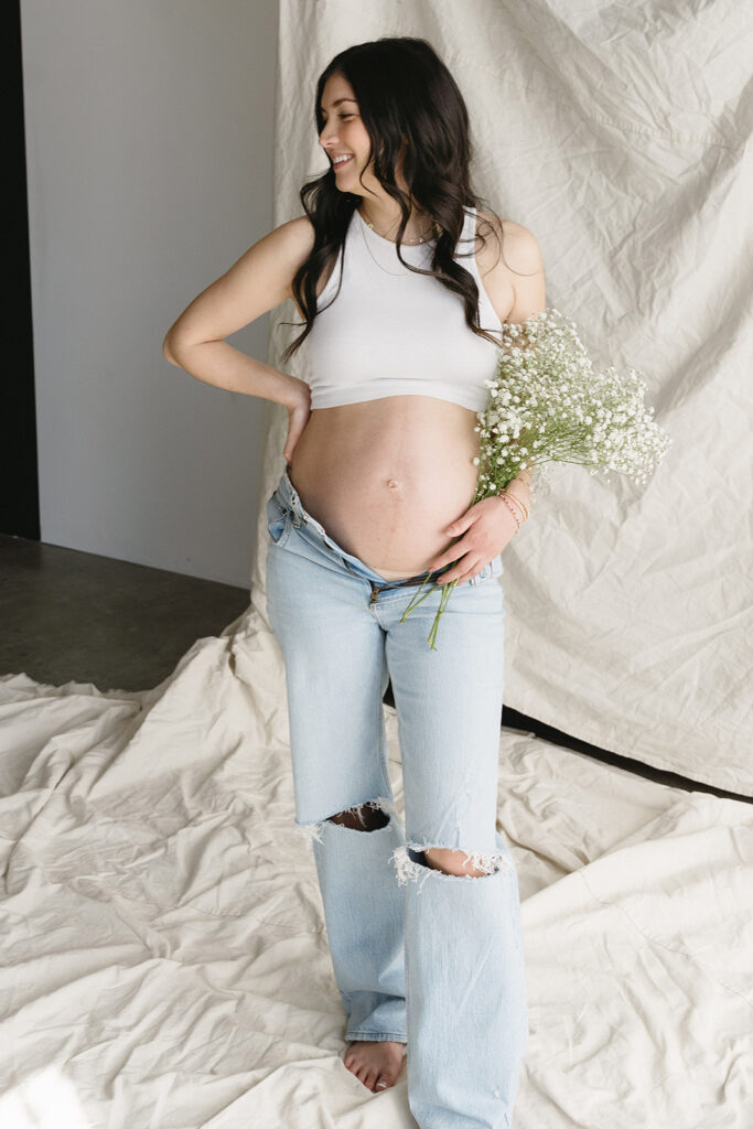 couple taking maternity photos in portland
