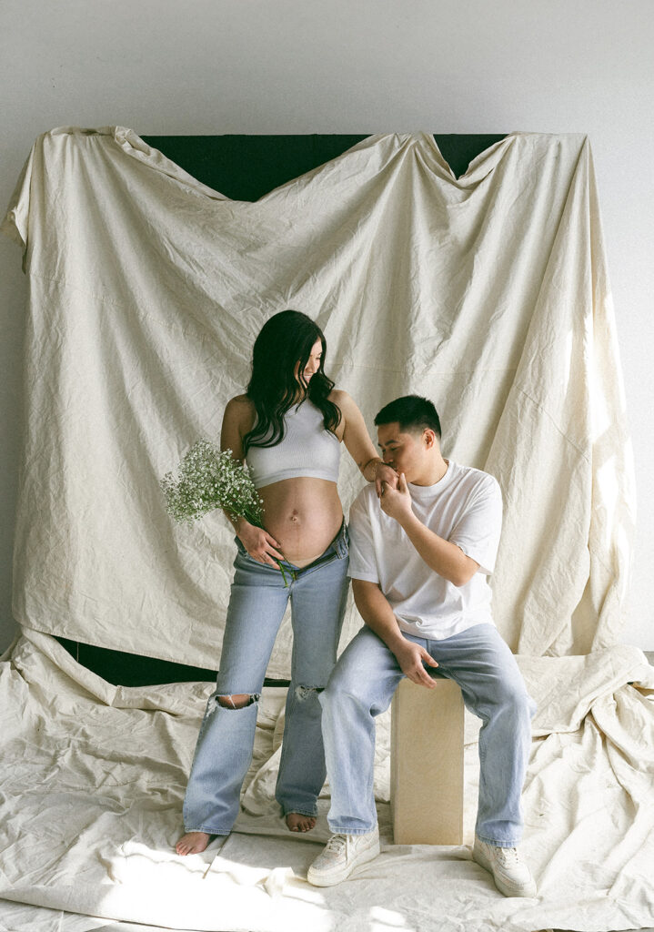 couple taking maternity photos in portland
