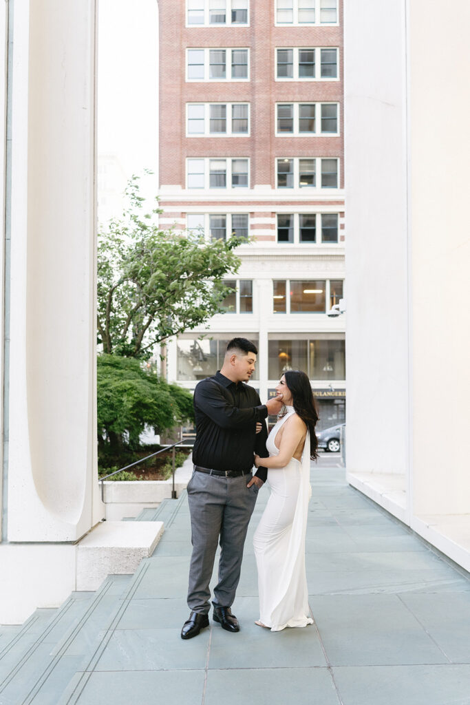 couple taking engagement photos in portland
