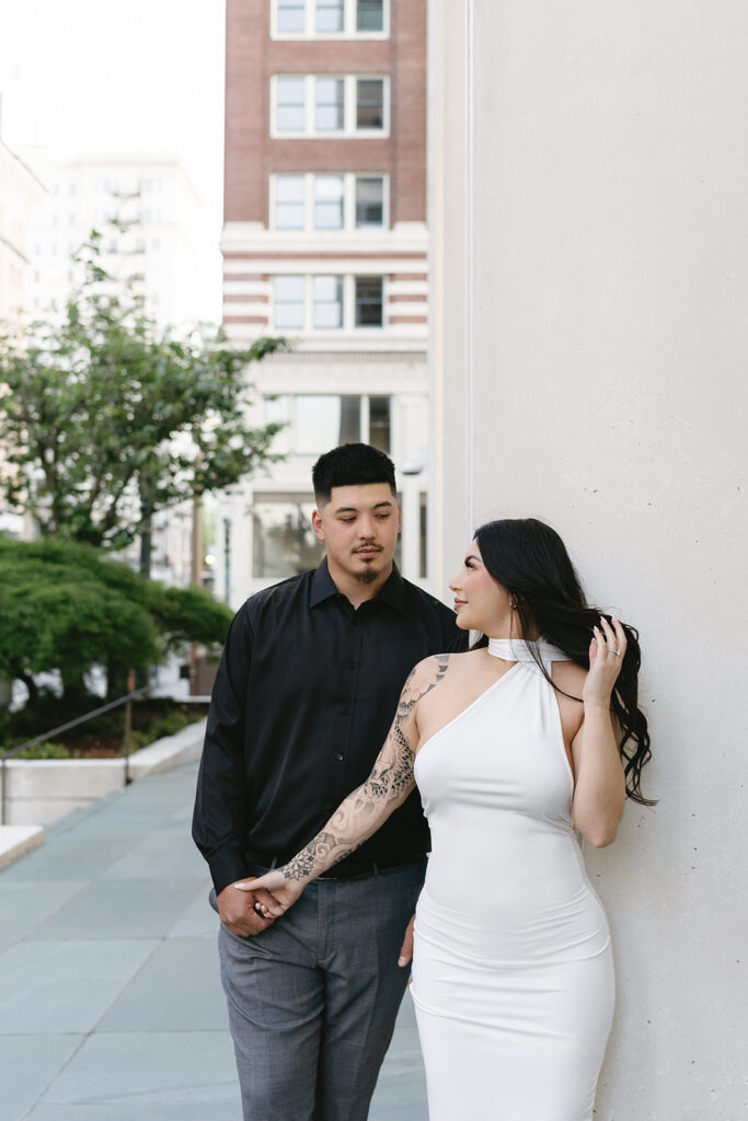 couple taking engagement photos in portland
