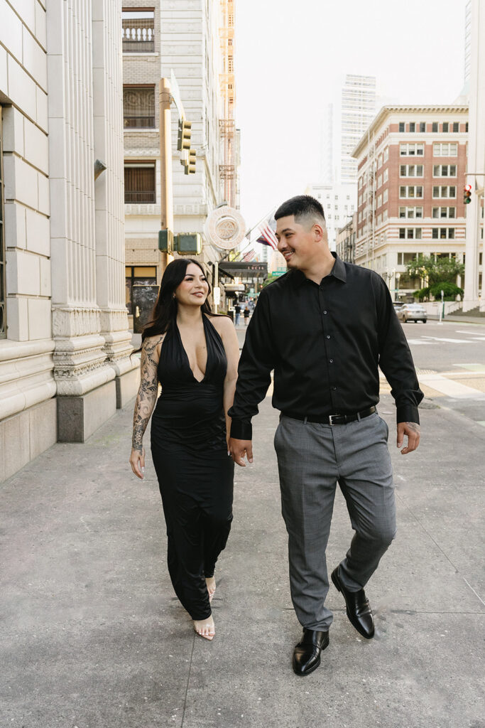 couple taking engagement photos in portland
