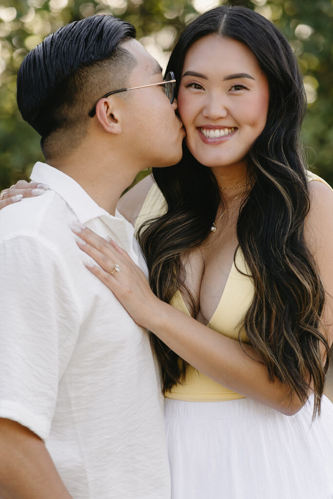 couple taking engagement photos in portland
