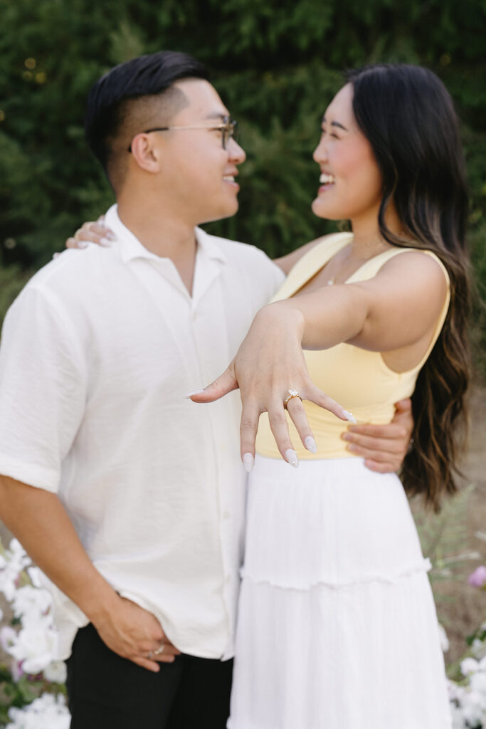 couple taking engagement photos in portland
