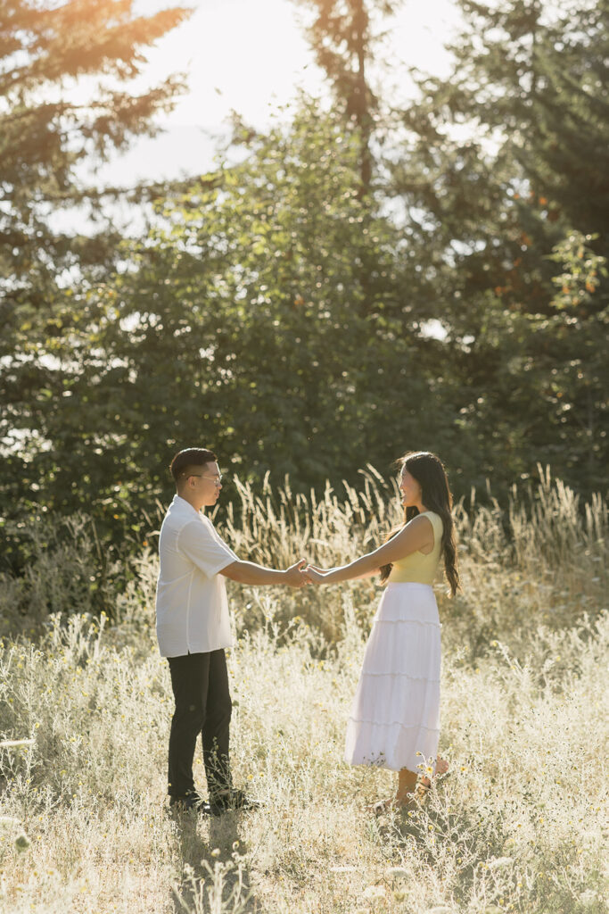 couple taking engagement photos in portland
