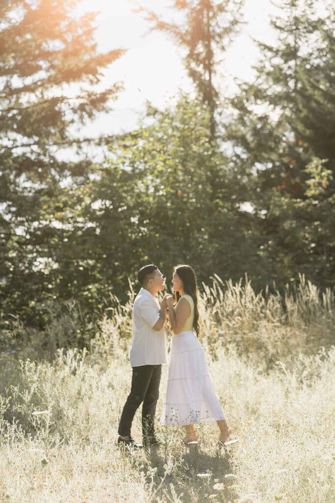 couple taking engagement photos in portland
