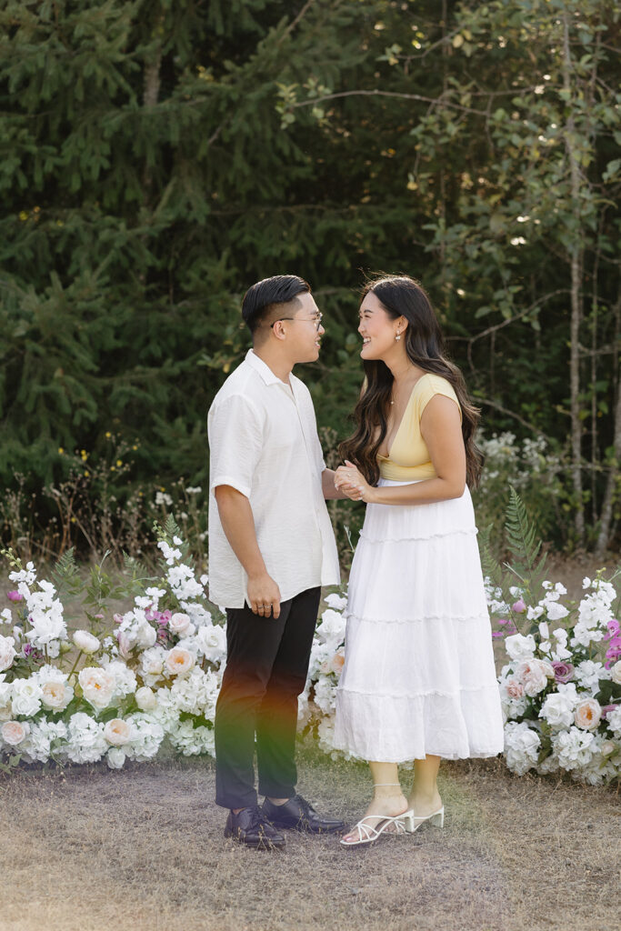 portland engagement photos in a field
