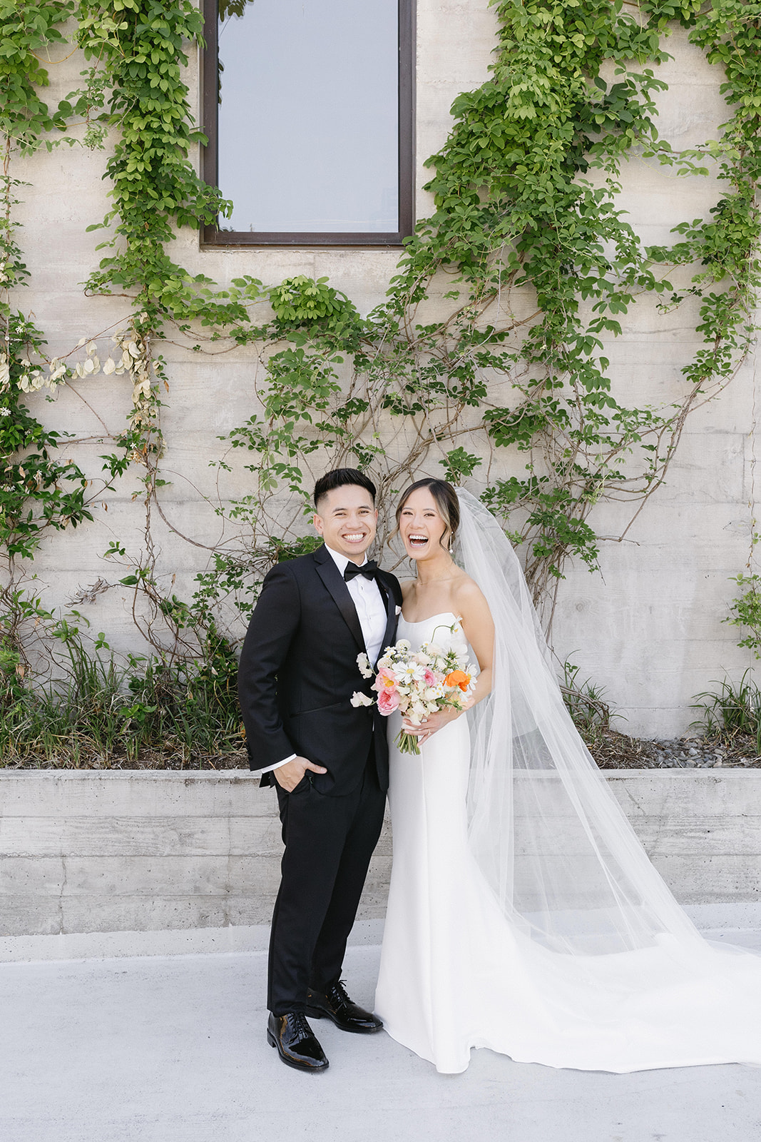 couple posing for wedding photos