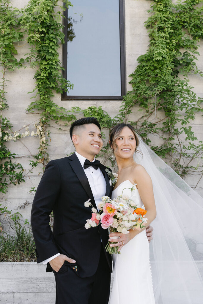 couple posing for wedding photos
