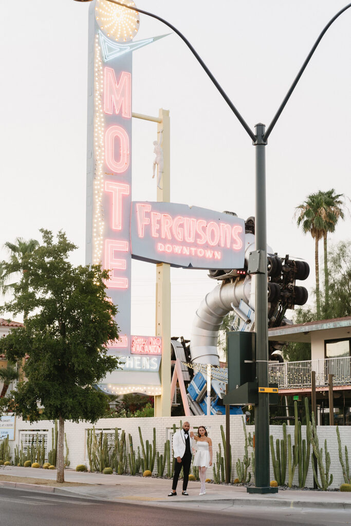 couple taking wedding photos in vegas
