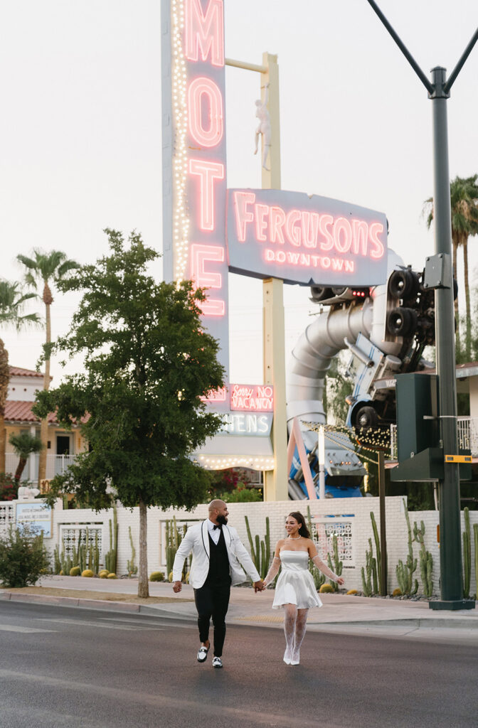 couple taking wedding photos in vegas
