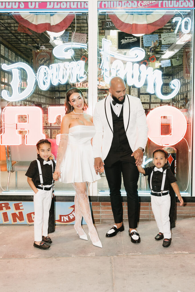 couple taking wedding photos in vegas
