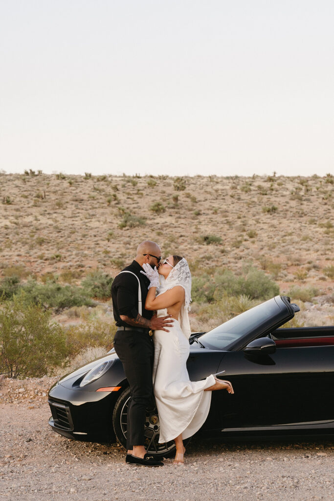 couple taking wedding photos in vegas
