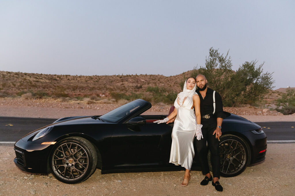 couple taking wedding photos in vegas
