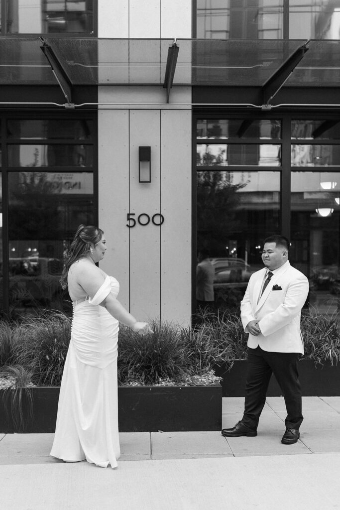 couple taking their elopement photos: An intimate downtown vancouver micro wedding
