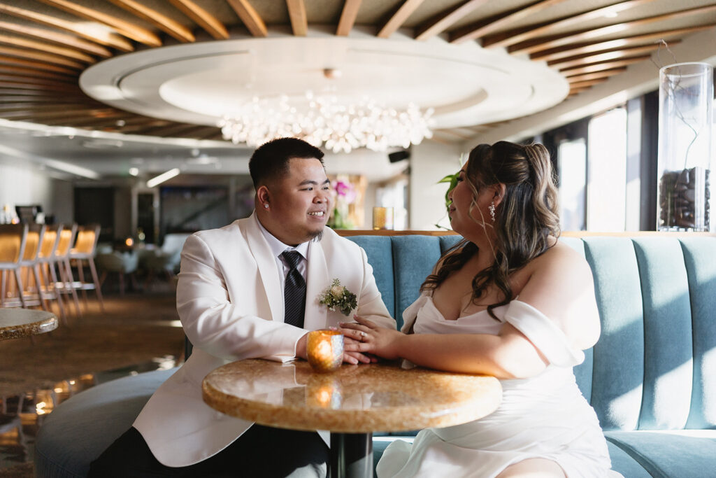 couple taking their elopement photos: An intimate downtown vancouver micro wedding
