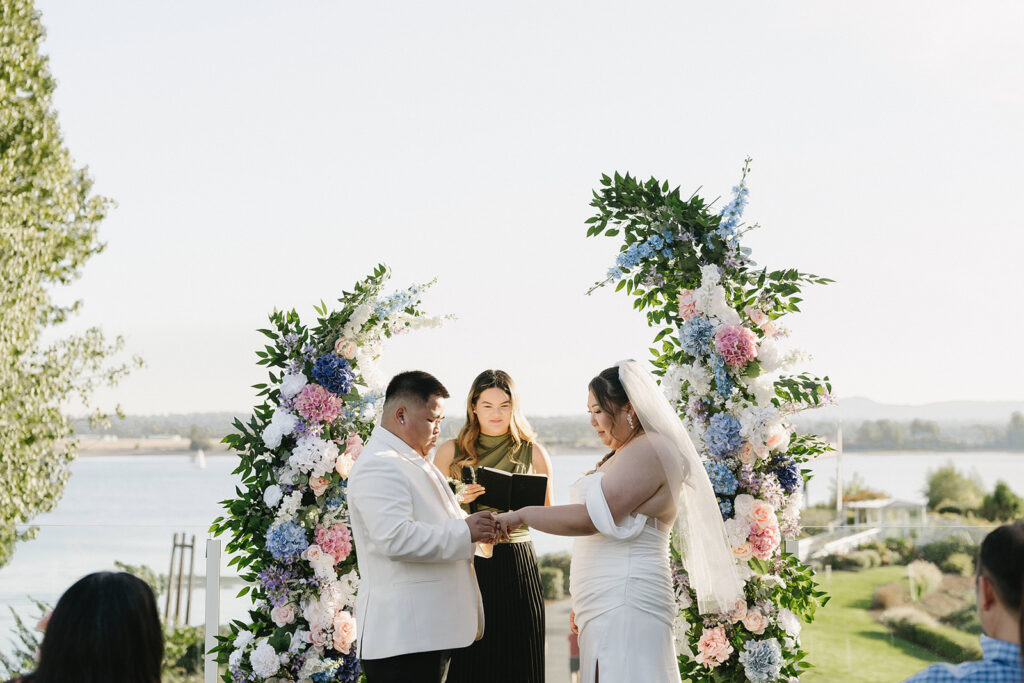 couple taking their elopement photos: An intimate downtown vancouver micro wedding
