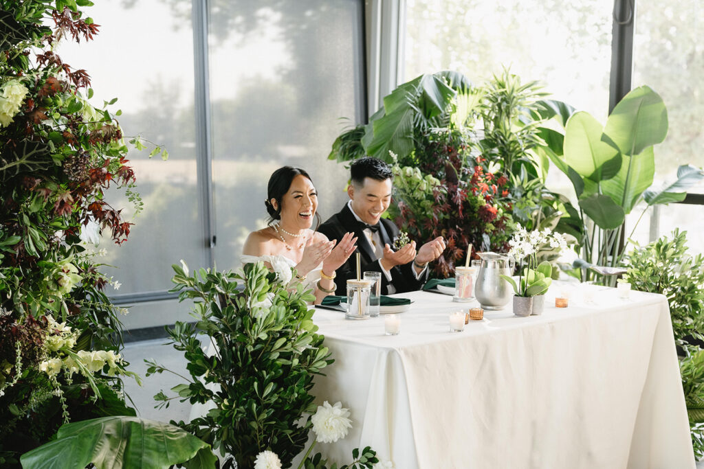 couple posing for their wedding photos 
