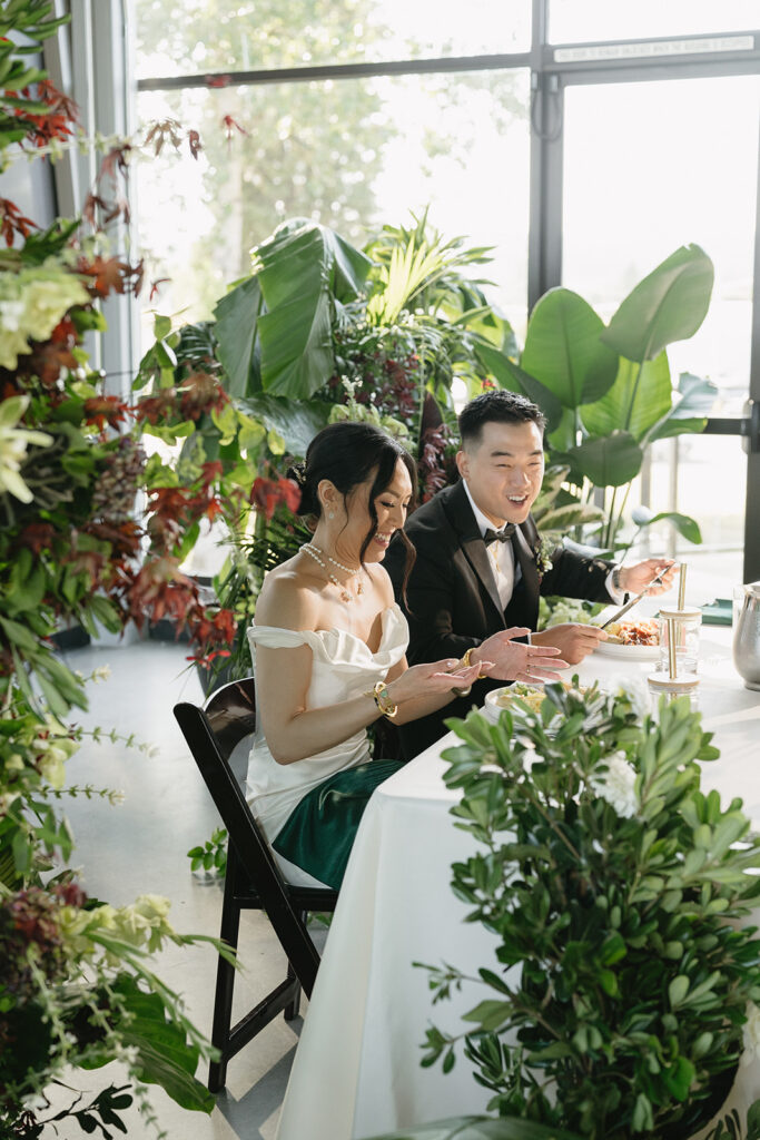 couple posing for their wedding photos 
