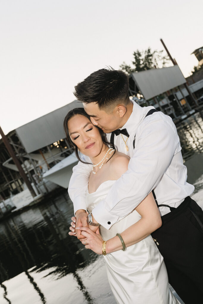 couple posing for their wedding photos 
