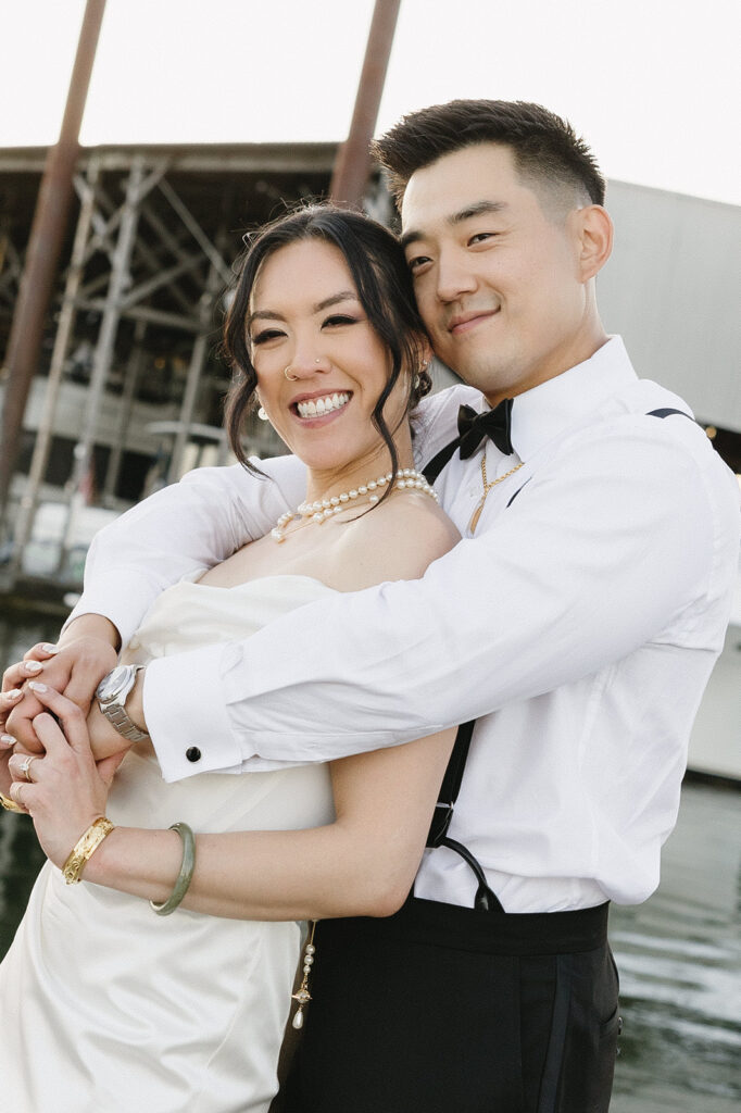 couple posing for their wedding photos 
