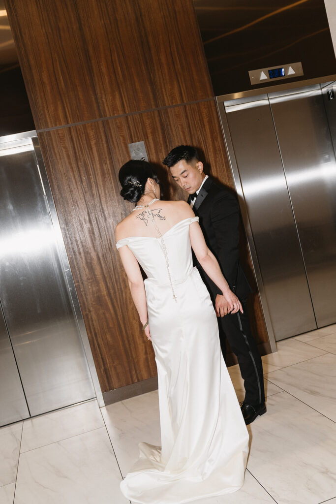 couple posing for their wedding photos 
