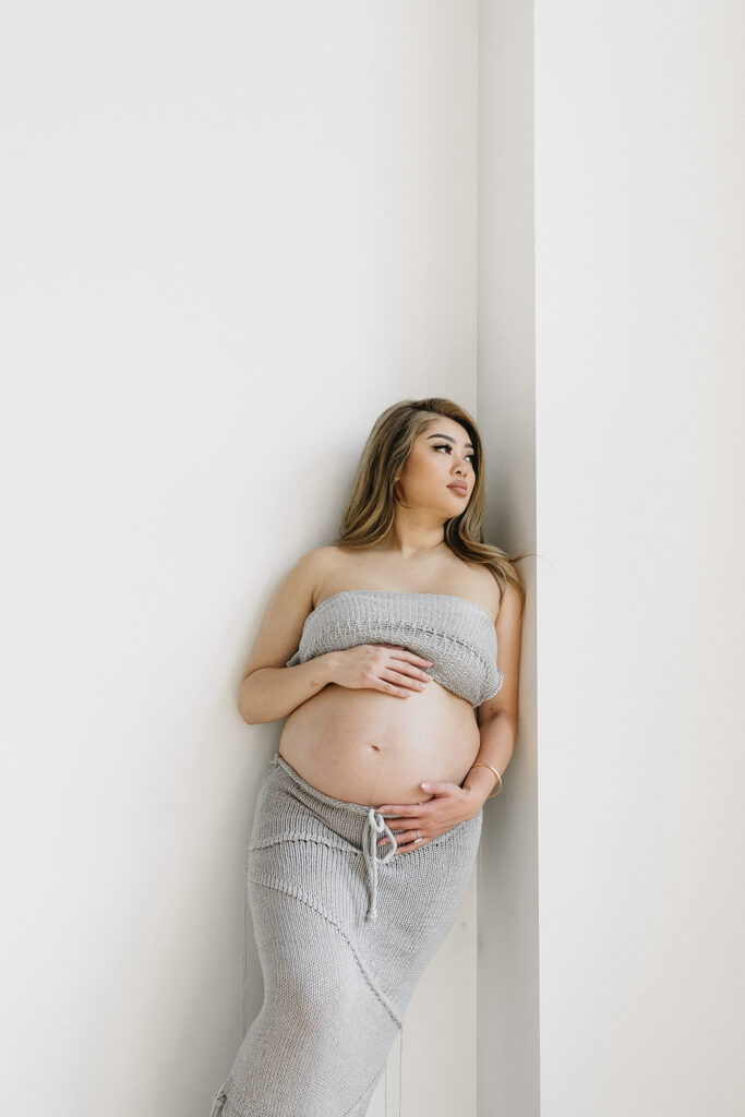 a maternity photoshoot in a studio
