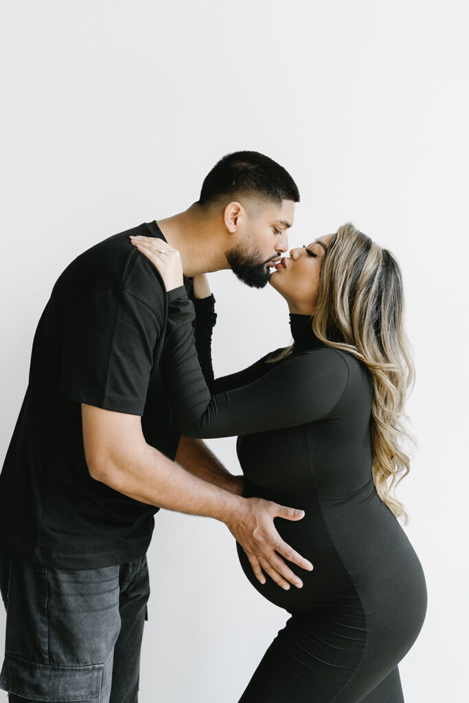 a maternity photoshoot in a studio
