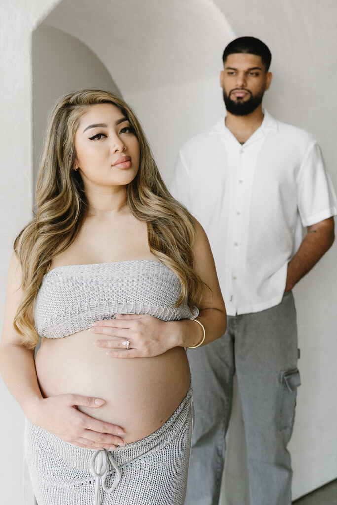 a maternity photoshoot in a studio
