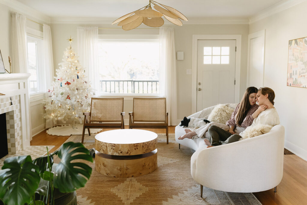 A loving family of three spending time together in their Portland home during an in-home session.
