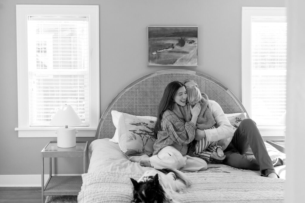 A loving family of three spending time together in their Portland home during an in-home session.
