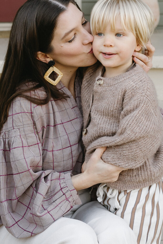 Candid photos of a family of three in their Portland home, surrounded by everyday moments.
