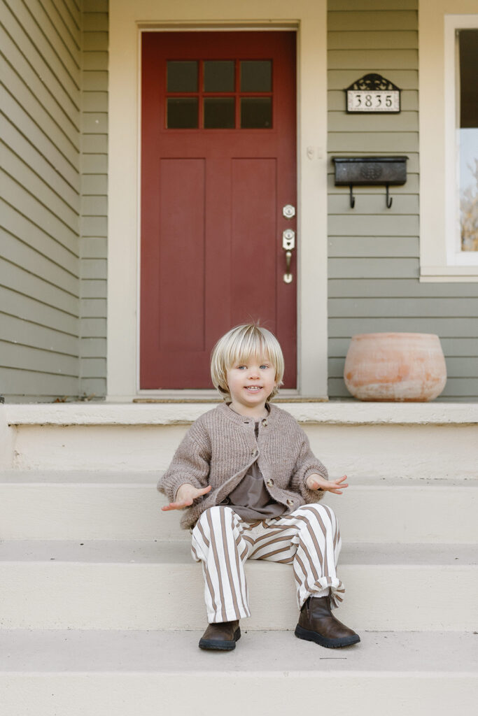 Candid photos of a family of three in their Portland home, surrounded by everyday moments.
