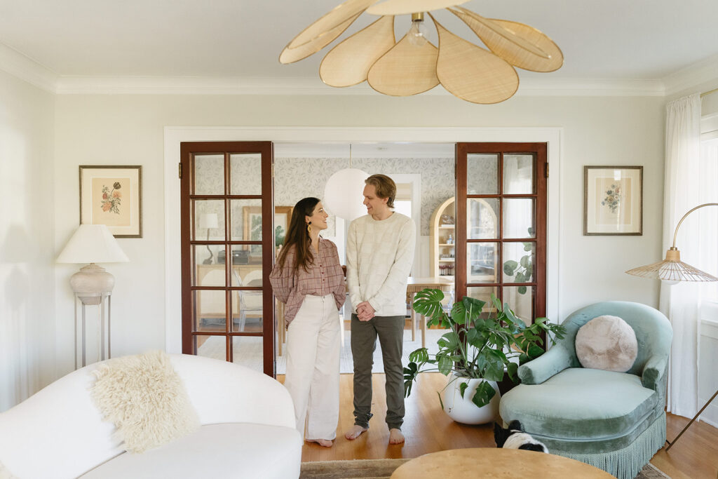 Candid photos of a family of three in their Portland home, surrounded by everyday moments.
