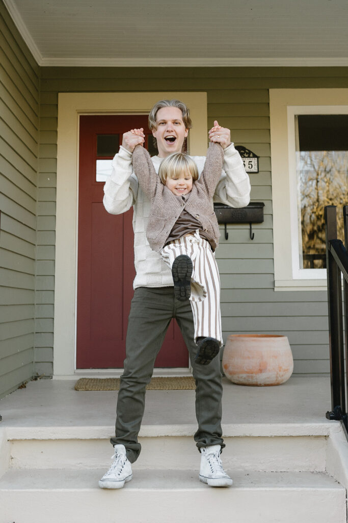 Candid photos of a family of three in their Portland home, surrounded by everyday moments.
