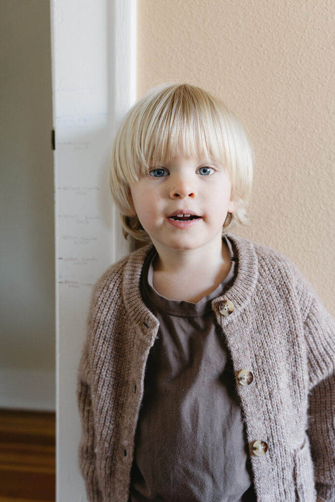 A sweet family of three captured in their cozy Portland home.
