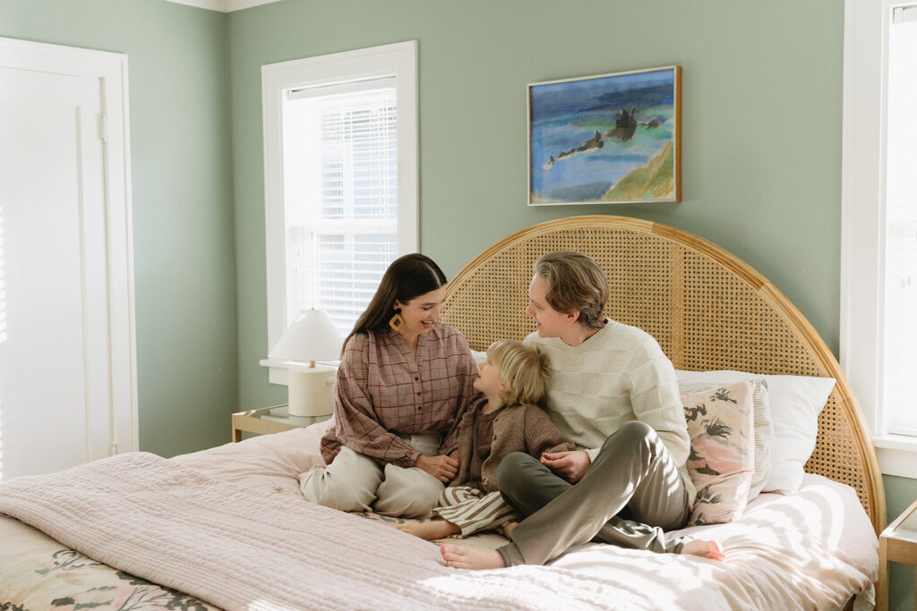 Candid photos of a family of three in their Portland home, surrounded by everyday moments.
