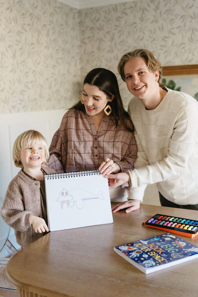 A loving family of three spending time together in their Portland home during an in-home session.
