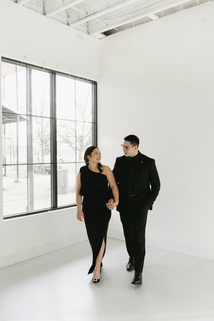 A couple sharing sweet moments during their pre-wedding photo session in a Washington studio.
