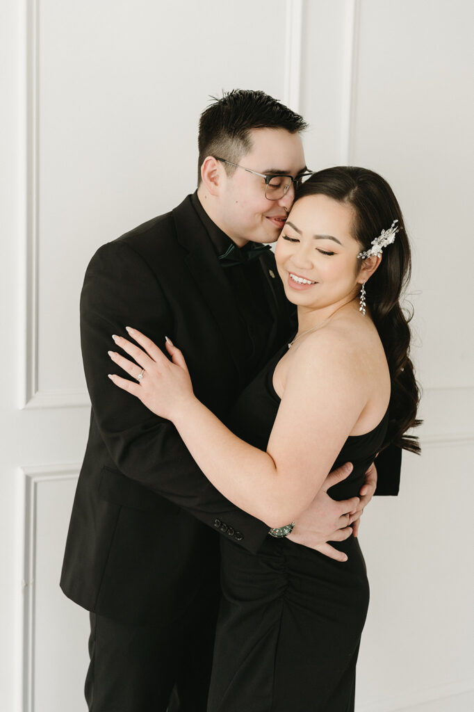 A soon-to-be-married couple capturing timeless portraits in a Washington studio.
